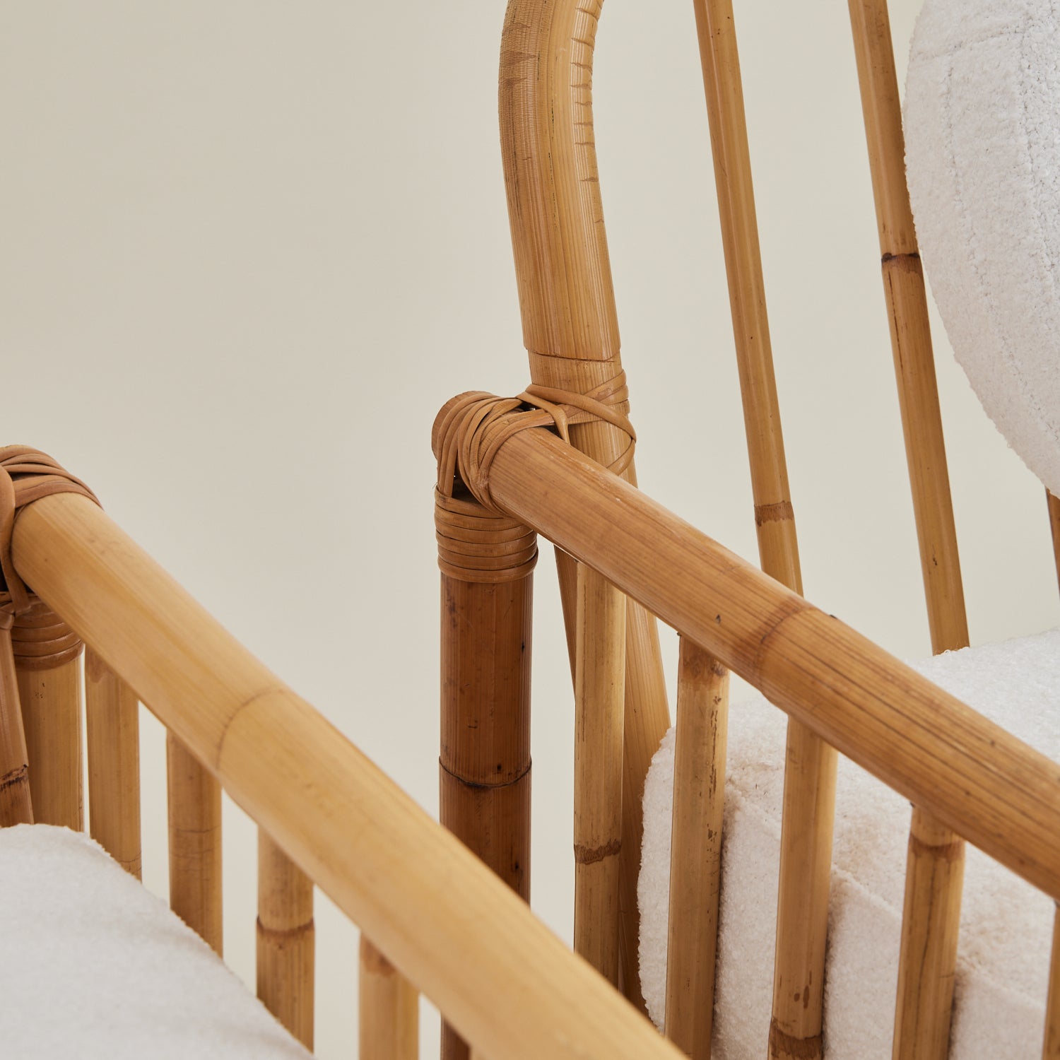 Vintage Italian Rattan Lounge chairs with boucle cushions, 1960's.