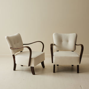Jindrich Halabala Patinated Bentwood Lounge Chairs, a pair, 1930's.