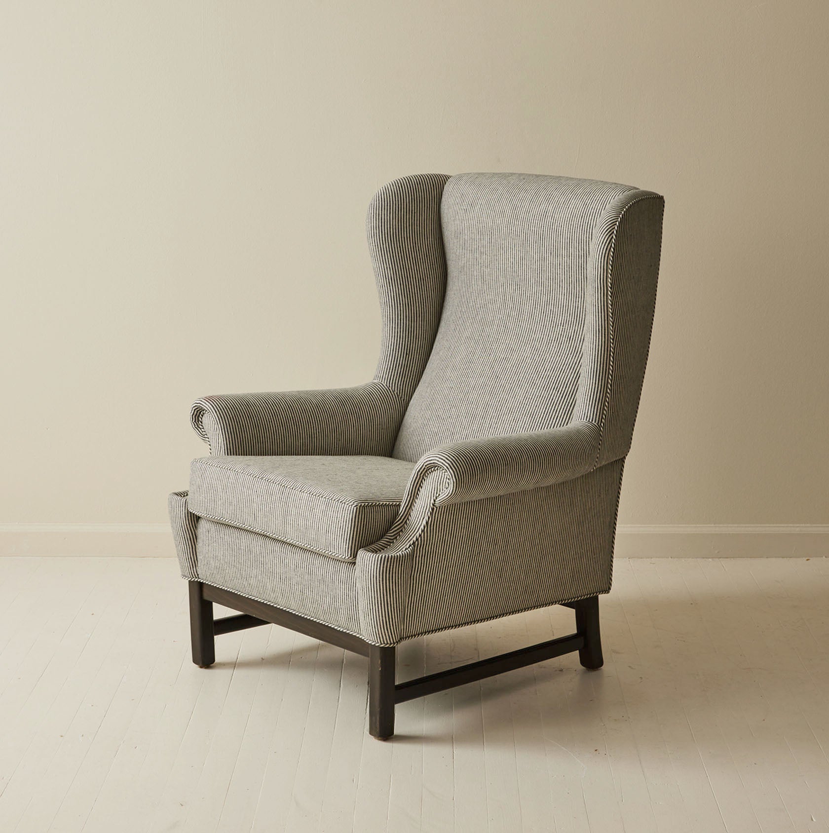 Svenskt Tenn 3543 "Oxford" Ear Flap Armchair, Ragnar Helsén, 1960's.
