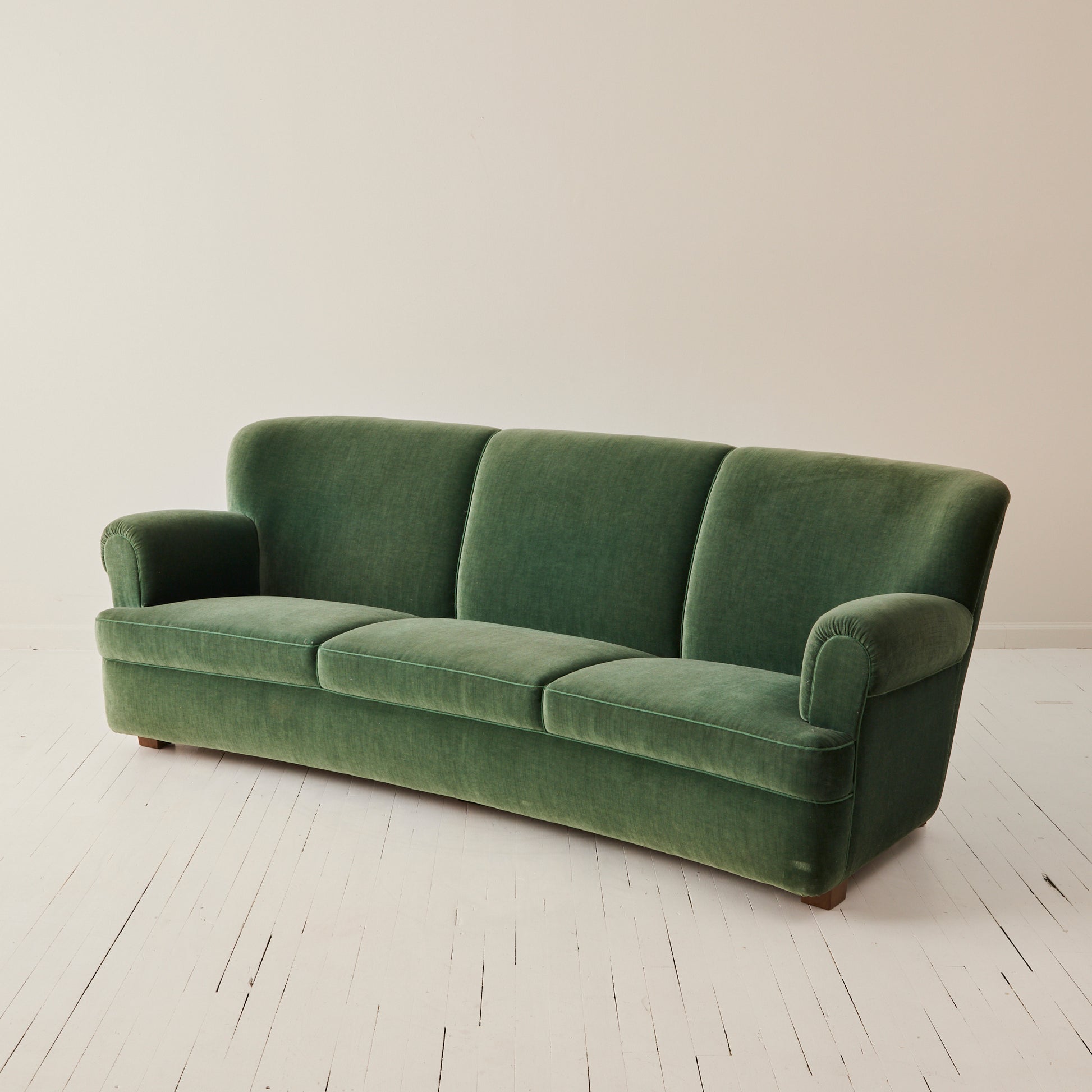 Danish velvet covered three seat sofa with slight curve, 1940's