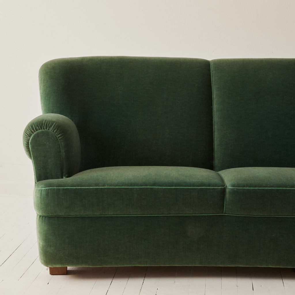 Danish velvet covered three seat sofa with slight curve, 1940's