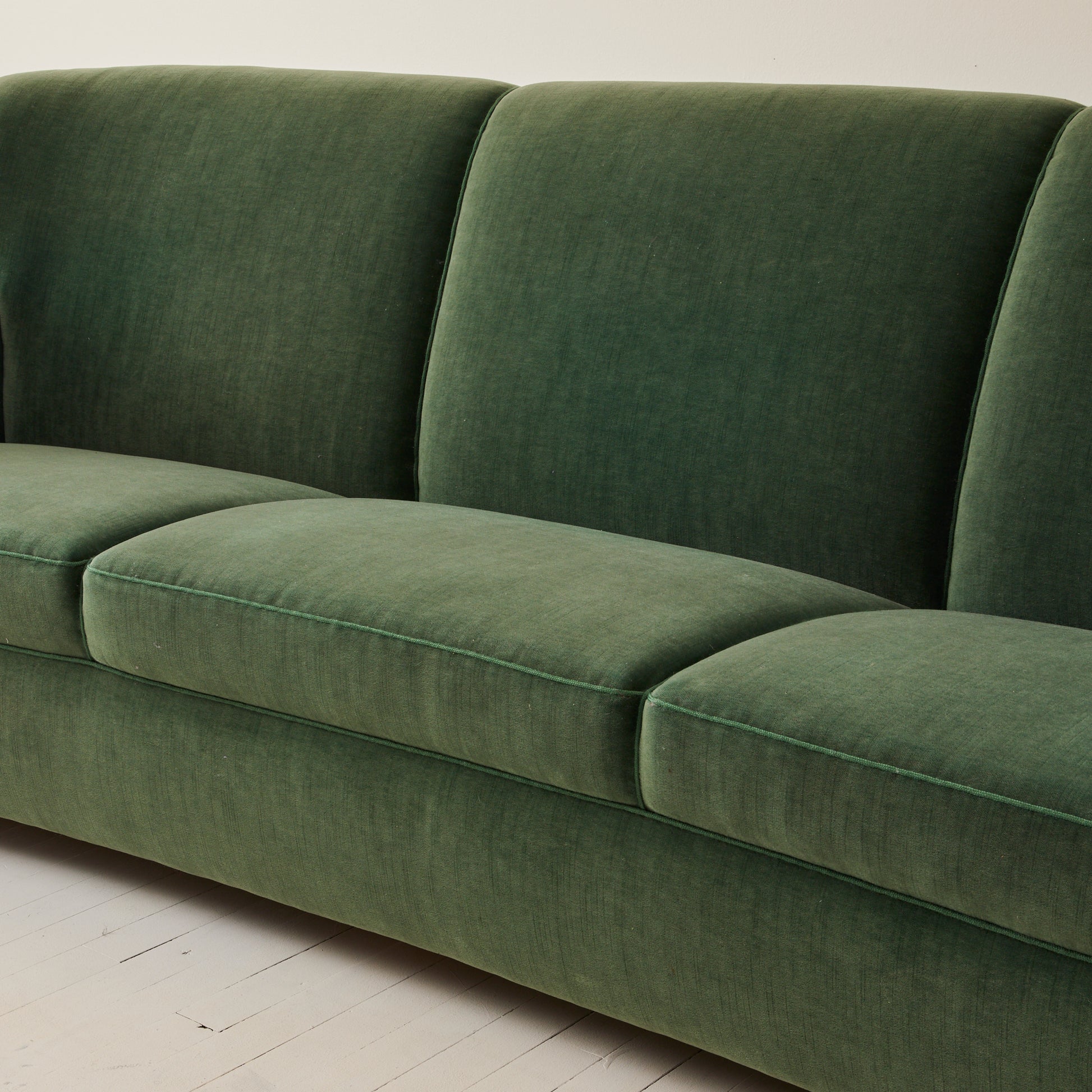 Danish velvet covered three seat sofa with slight curve, 1940's