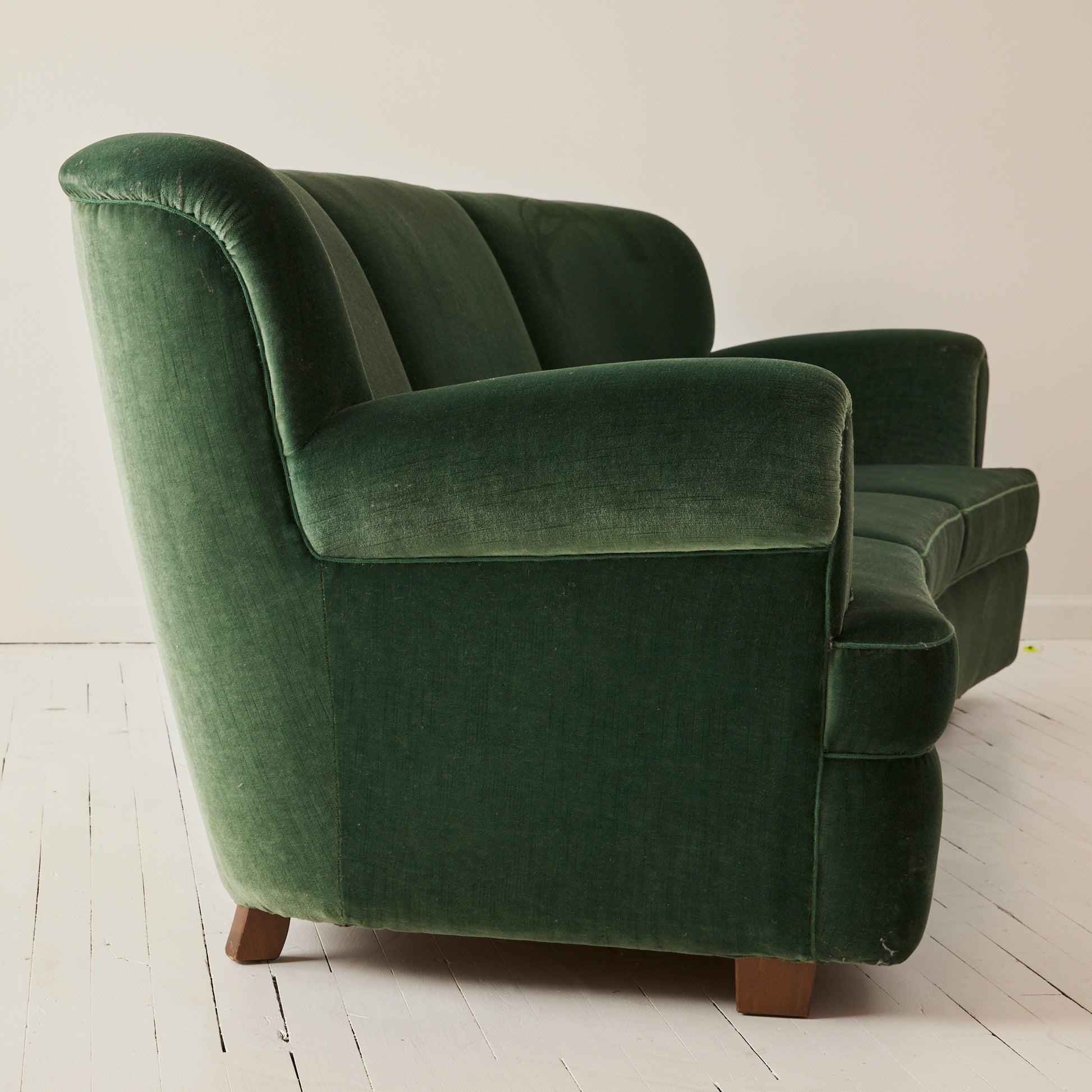 Danish velvet covered three seat sofa with slight curve, 1940's