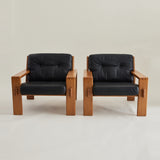 Esko Pajamies Finnish Leather and Oak "Bonanza" Lounge chairs, 1960's, a pair.