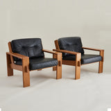 SOLD Esko Pajamies Finnish Leather and Oak "Bonanza" Lounge chairs, 1960's, a pair.