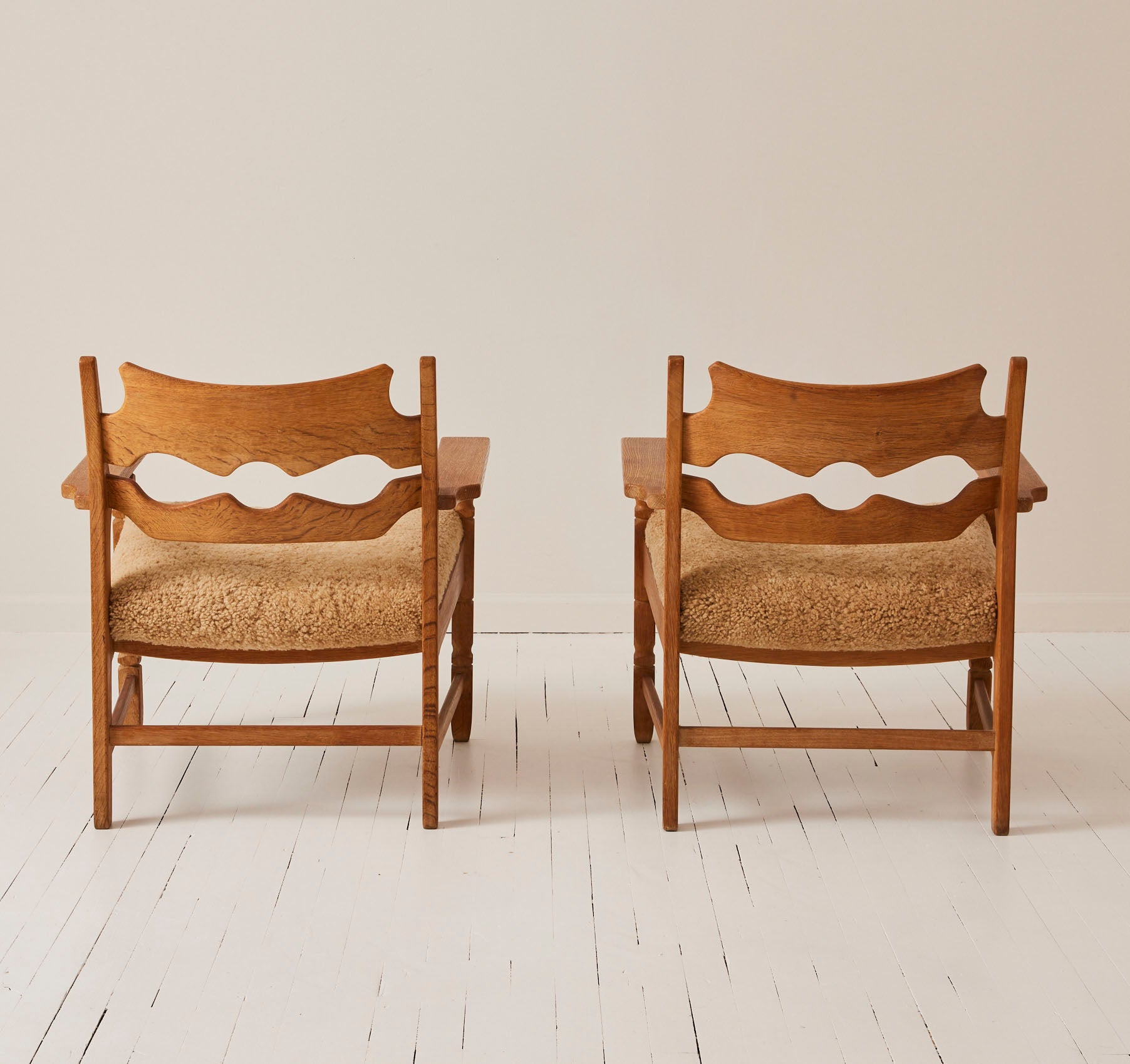 SOLD Henry Kjærnulf "Razorblade" Lounge Chairs in Oak and Sheepskin Seat, 1960s - Set of 2