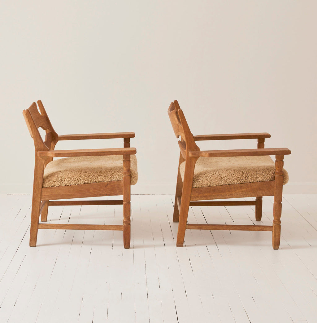 SOLD Henry Kjærnulf "Razorblade" Lounge Chairs in Oak and Sheepskin Seat, 1960s - Set of 2