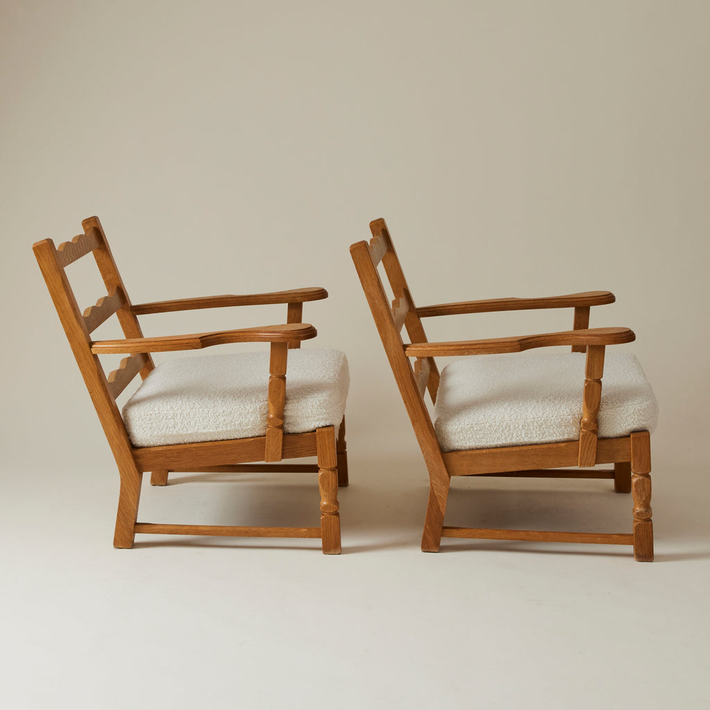 SOLD Swedish Oak Lounge Chairs with boucle cushion, 1960's, a pair
