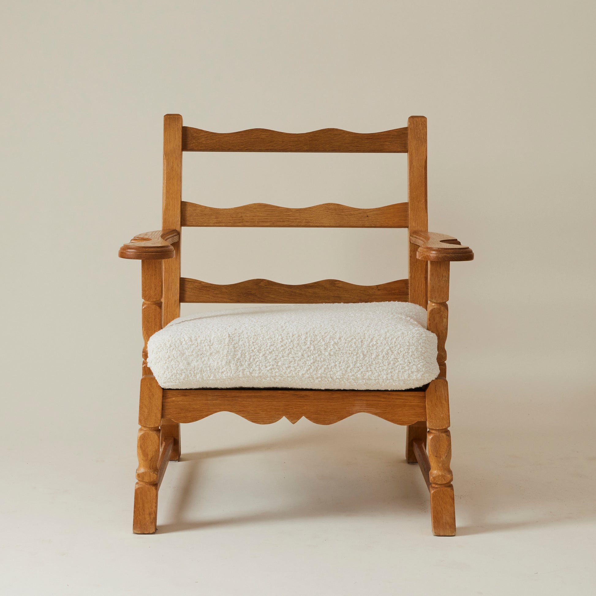 SOLD Swedish Oak Lounge Chairs with boucle cushion, 1960's, a pair
