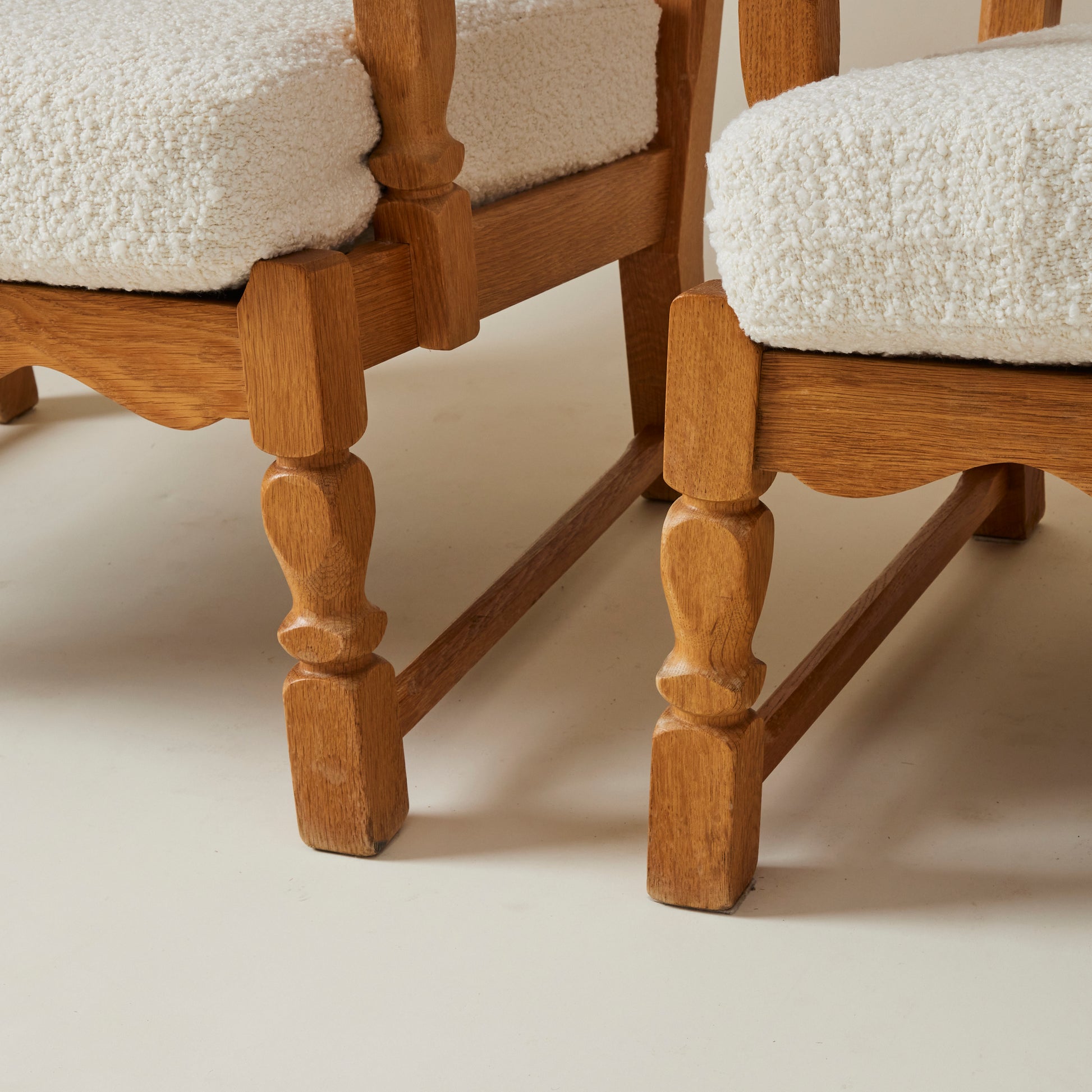 SOLD Swedish Oak Lounge Chairs with boucle cushion, 1960's, a pair