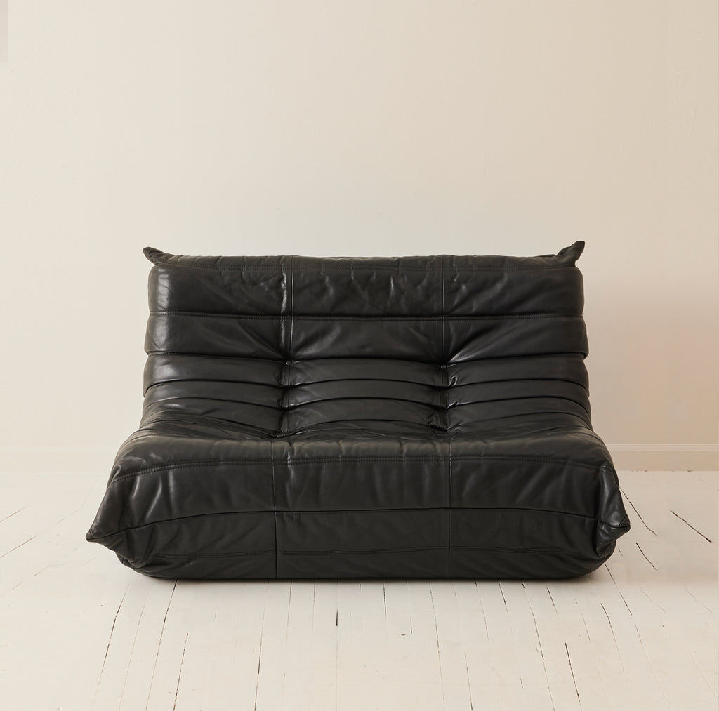 Ligne Roset "Togo" 2 person sofa in black leather, 1970's.