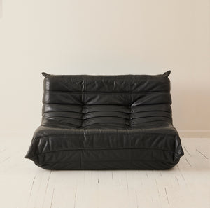Ligne Roset "Togo" 2 person sofa in black leather, 1970's.