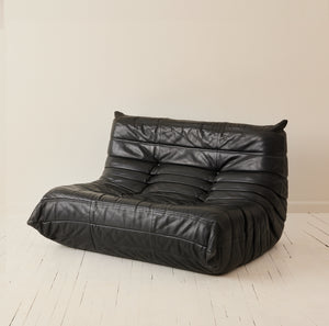 Ligne Roset "Togo" 2 person sofa in black leather, 1970's.