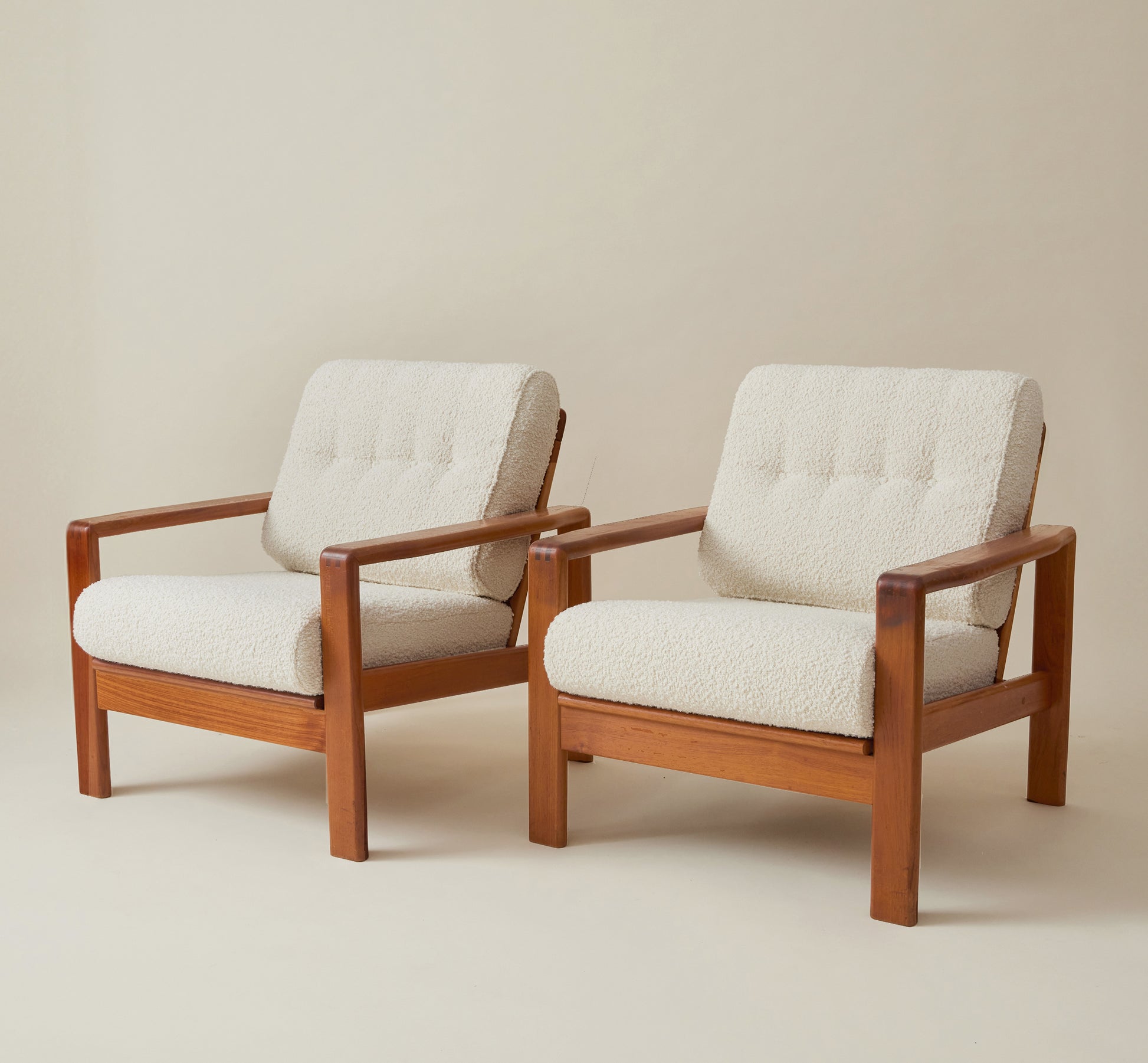 Swedish Mid-Century Teak Easy Chairs with Ivory Boucle Cushions, a pair