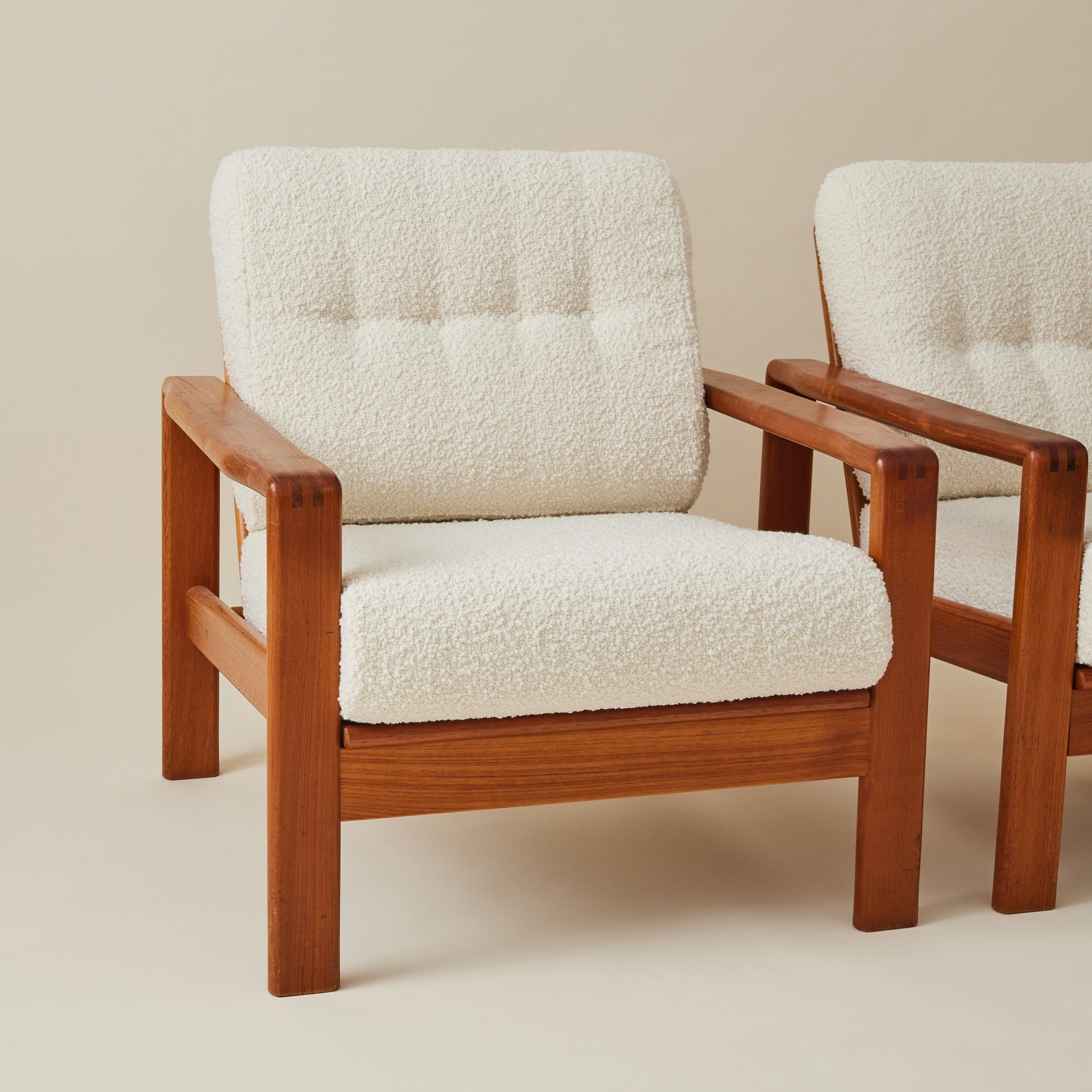 Swedish Mid-Century Teak Easy Chairs with Ivory Boucle Cushions, a pair