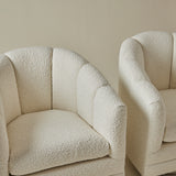 Mid Century Ivory Boucle Swivel Chairs in the style of Milo Baughman, a pair