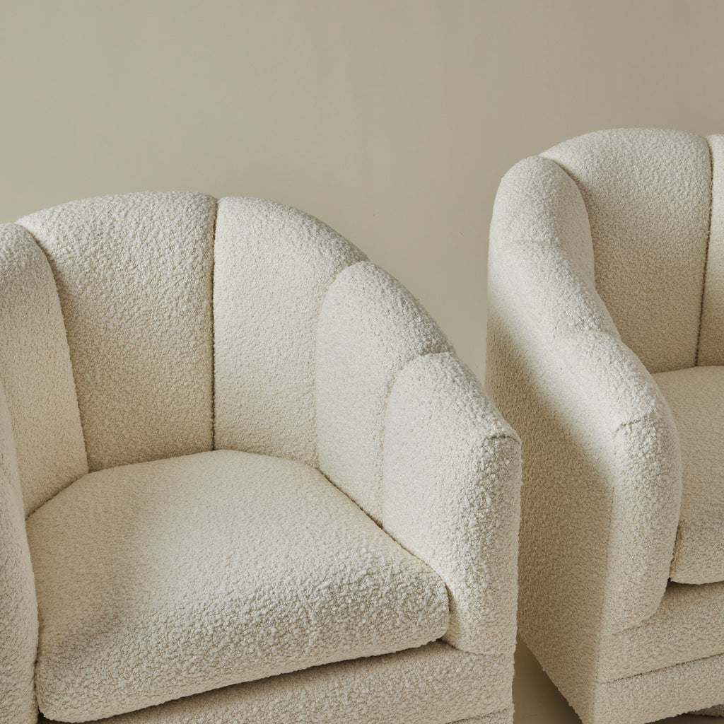 Mid Century Ivory Boucle Swivel Chairs in the style of Milo Baughman, a pair