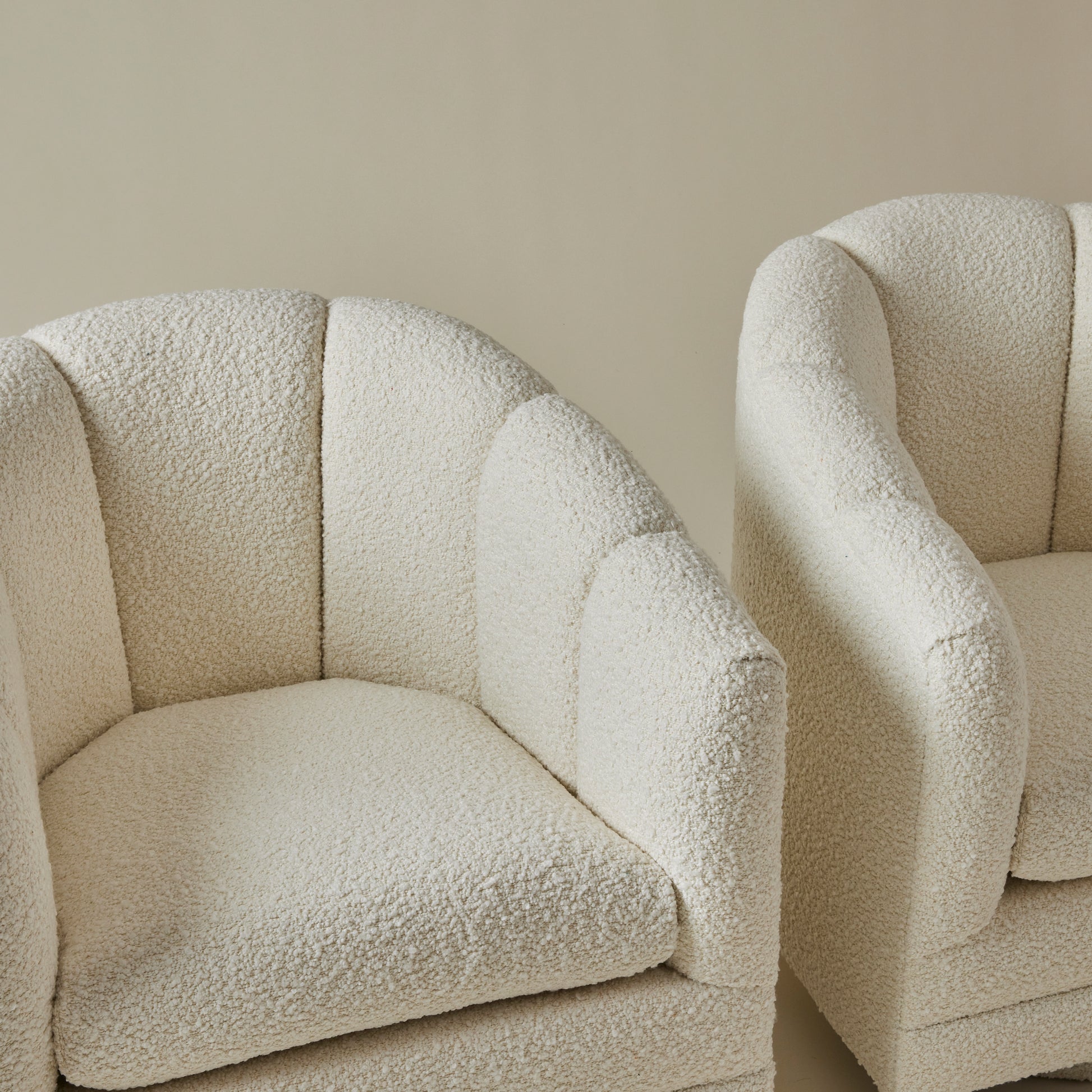 Mid Century Ivory Boucle Swivel Chairs in the style of Milo Baughman, a pair