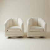 Mid Century Ivory Boucle Swivel Chairs in the style of Milo Baughman, a pair