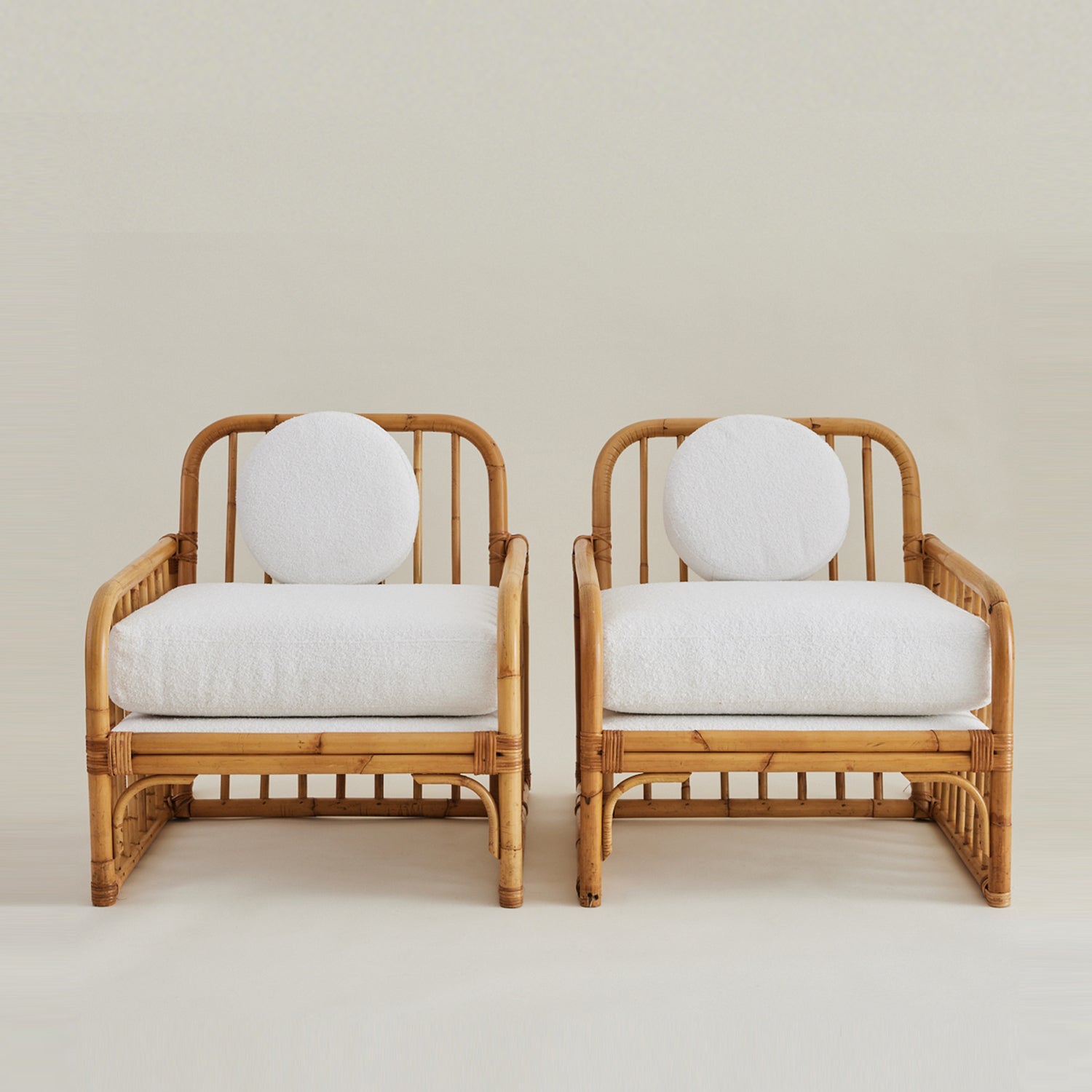 Vintage Italian Rattan Lounge chairs with boucle cushions, 1960's.
