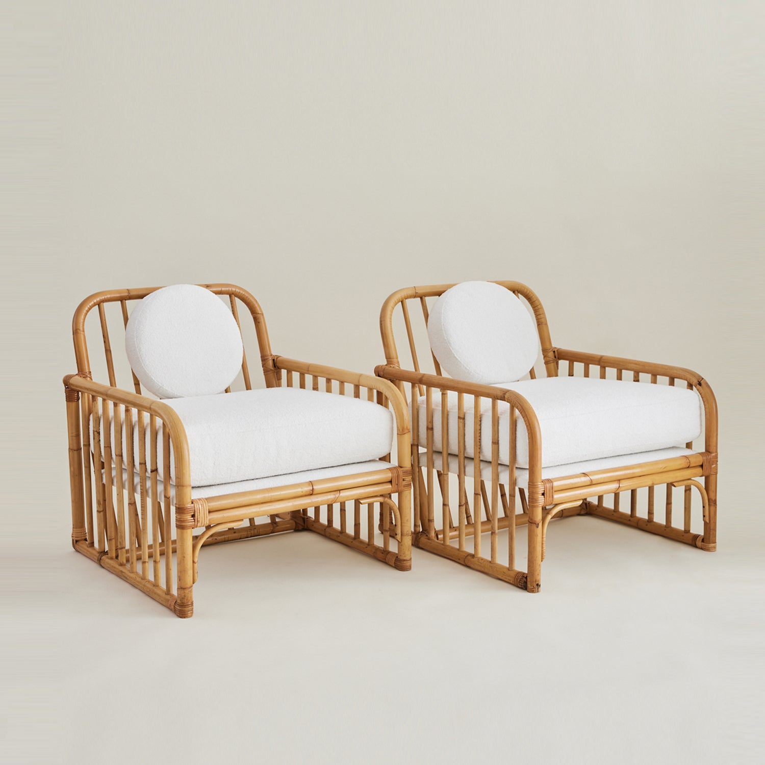 Vintage Italian Rattan Lounge chairs with boucle cushions, 1960's.