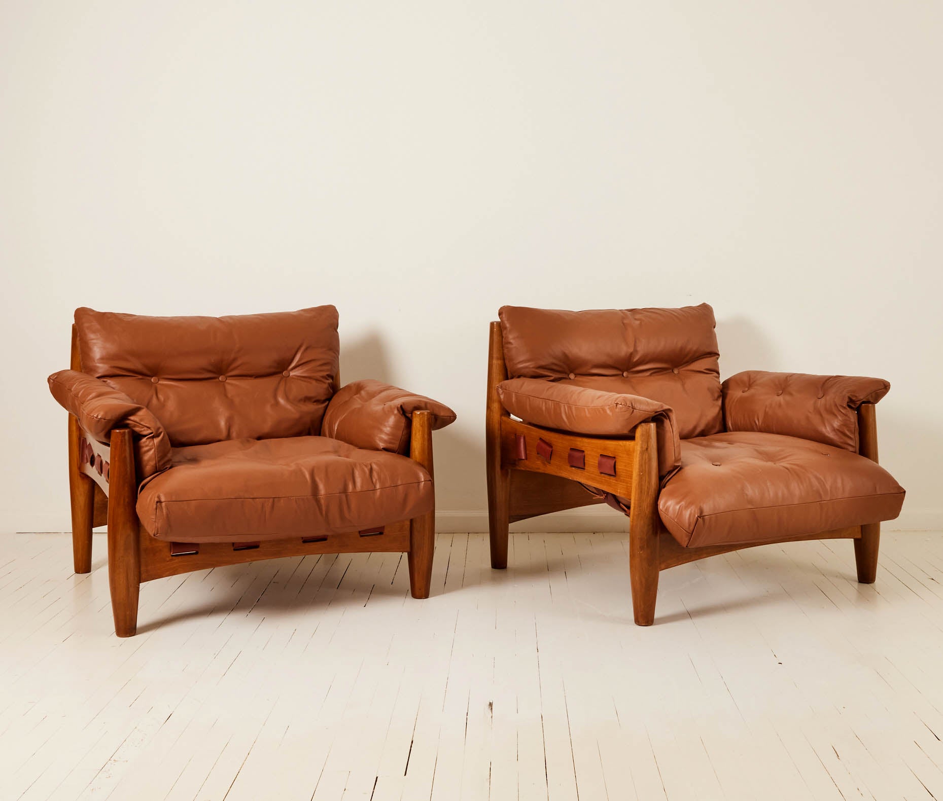 SOLD Sergio Rodrigues "Sheriff" Brazilian Leather Lounge Chair, a pair 1960's