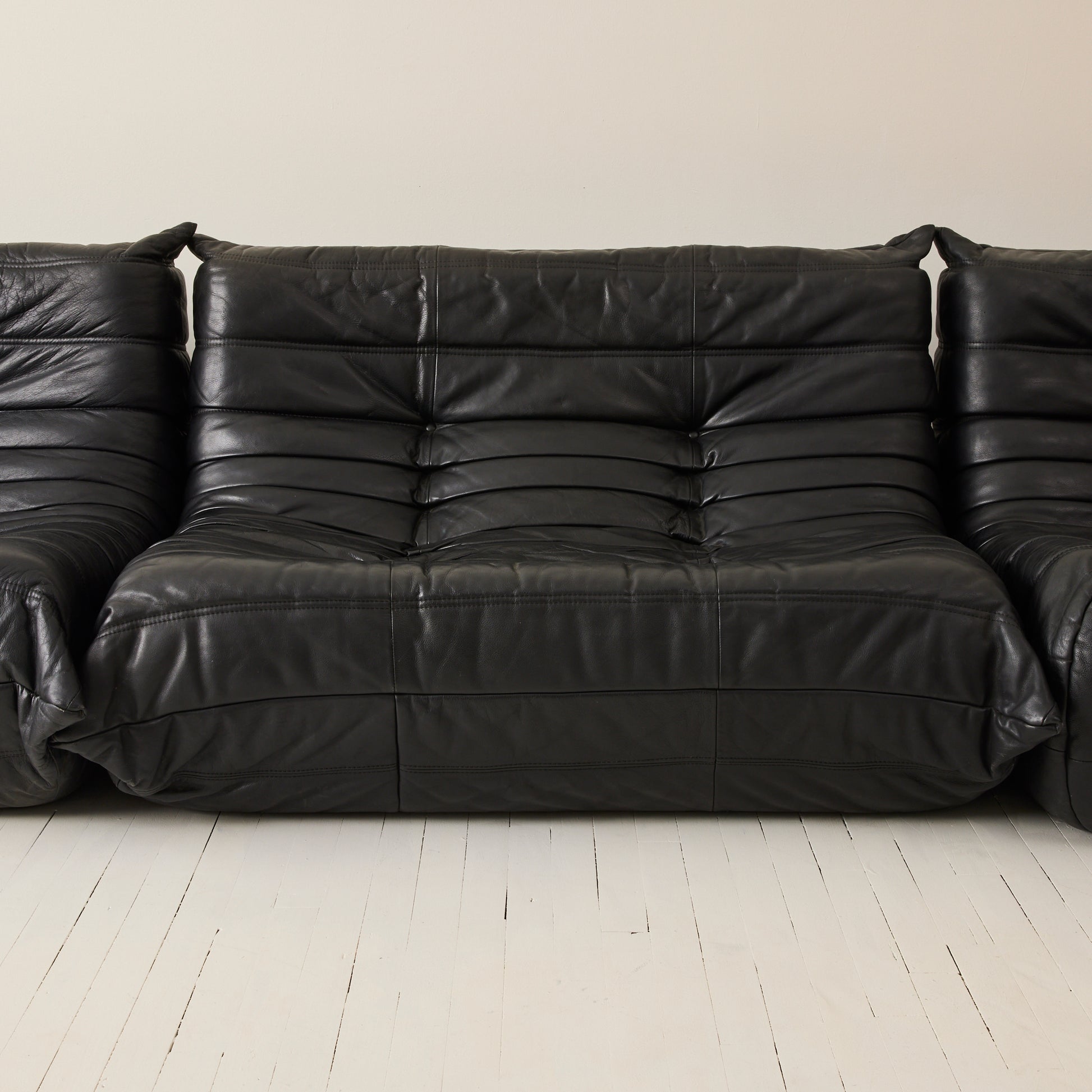 Ligne Roset "Togo" 2 person sofa in black leather, 1970's.