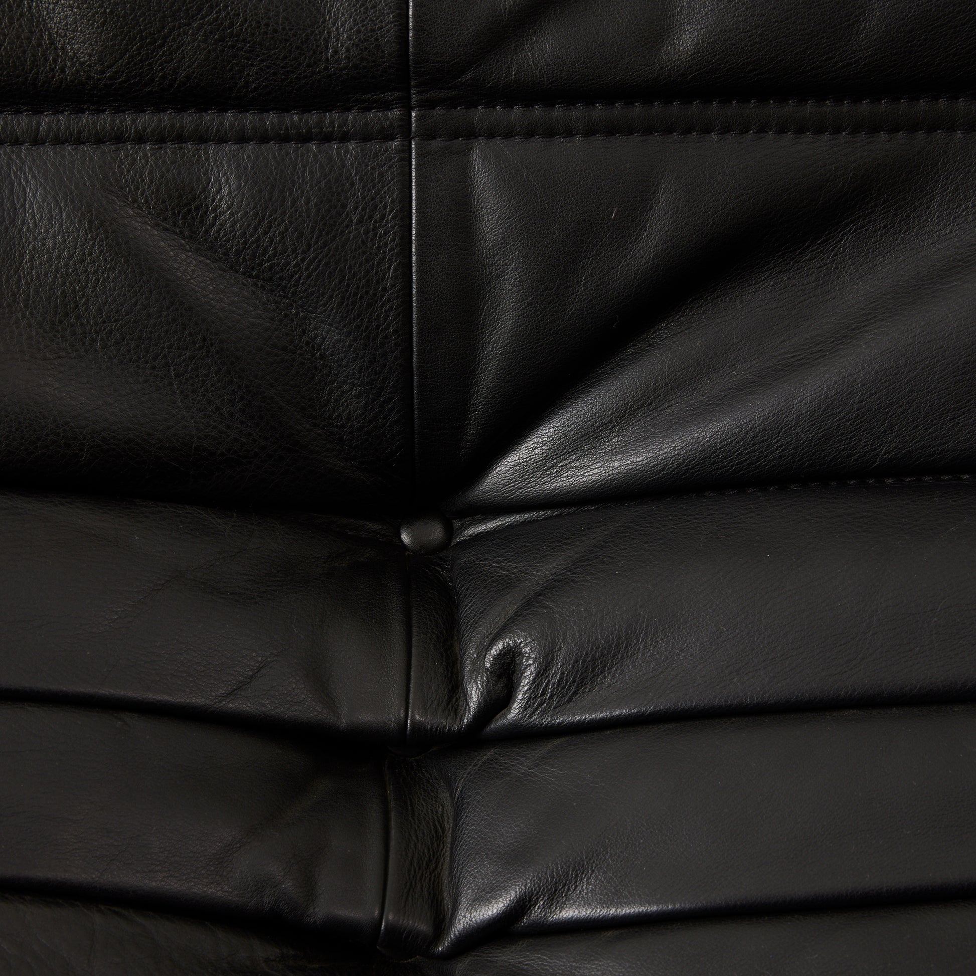 Ligne Roset "Togo" 2 person sofa in black leather, 1970's.