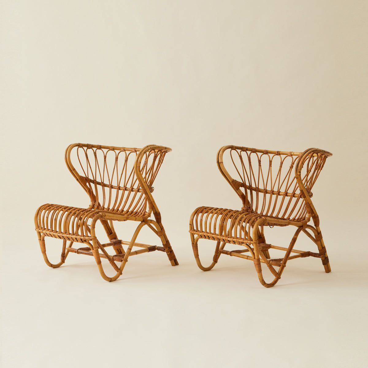 Viggo Boesen Danish Rattan “Fox Chairs”, a Pair, Mid Century, 1960's