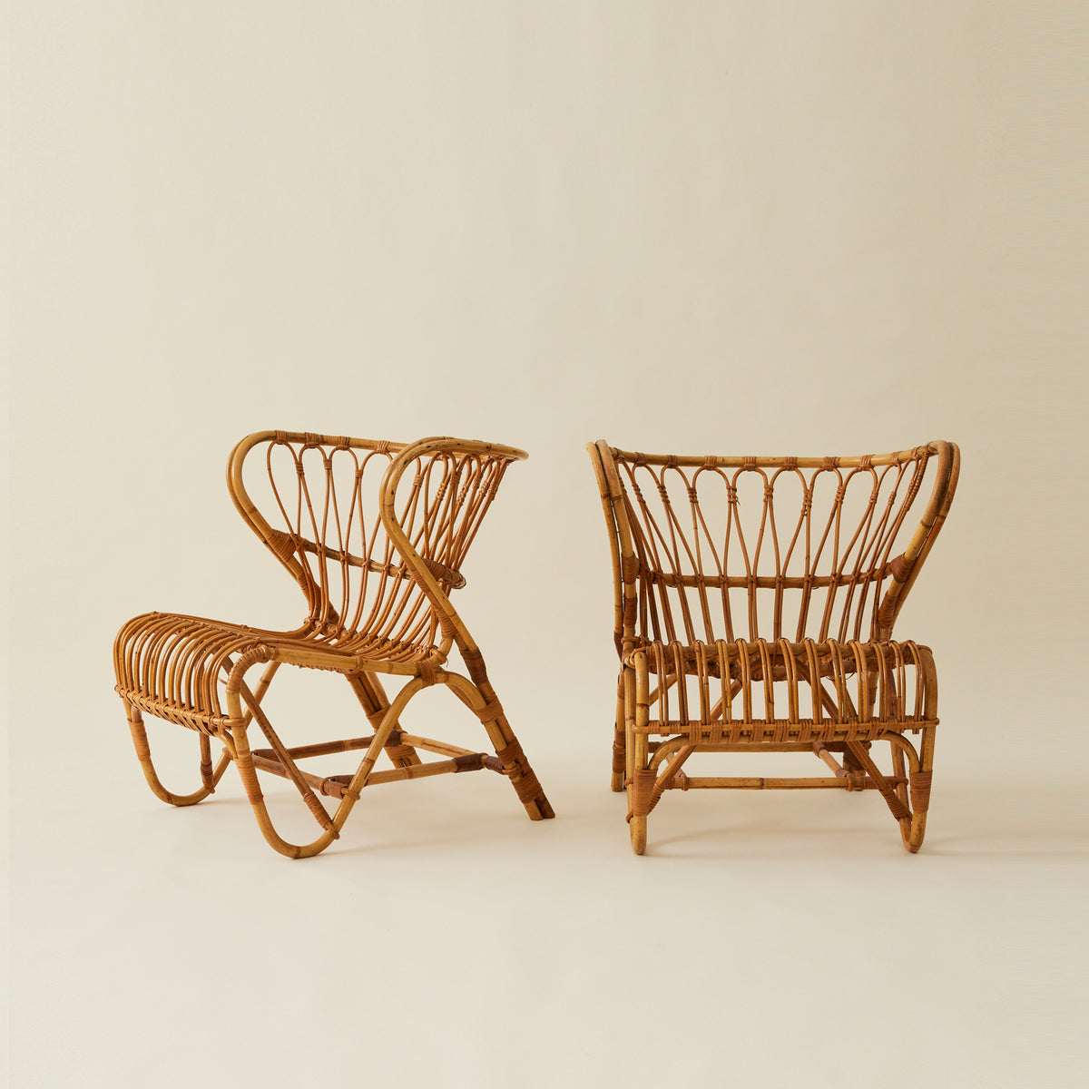 Viggo Boesen Danish Rattan “Fox Chairs”, a Pair, Mid Century, 1960's